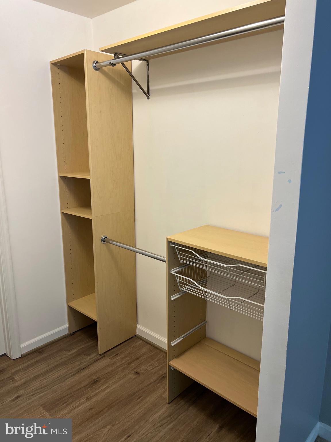 5918 Cove Landing Road, Unit 204 Burke, VA 22015 - Photo 19 of 39 a view of walk in closet with empty racks
