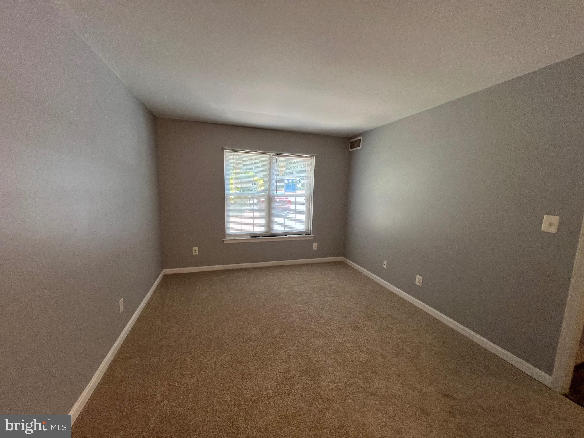 5918 Cove Landing Road, Unit 204 Burke, VA 22015 - Photo 21 of 39 an empty room with a window