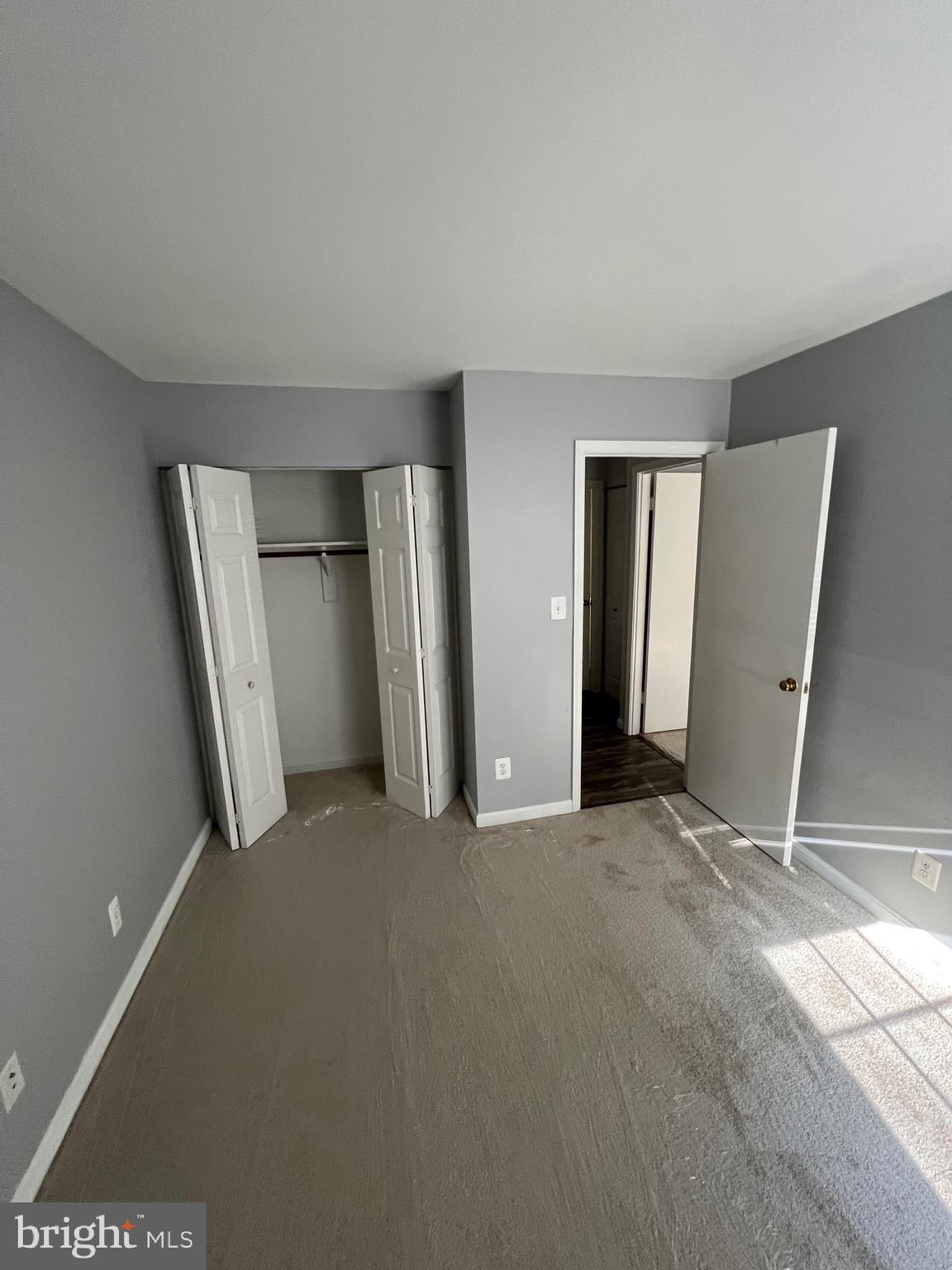 5918 Cove Landing Road, Unit 204 Burke, VA 22015 - Photo 26 of 39 a view of empty room with front door