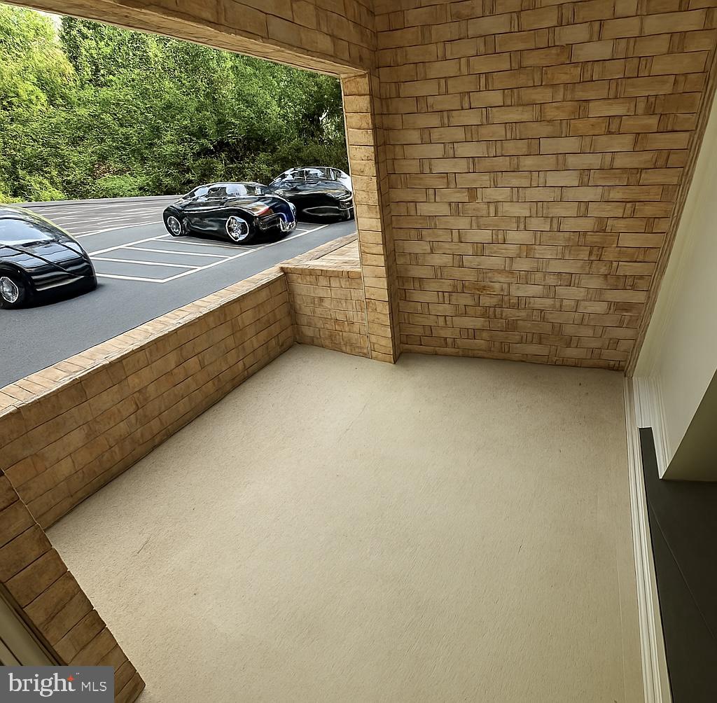 5918 Cove Landing Road, Unit 204 Burke, VA 22015 - Photo 31 of 39 a view of a car parked on the side of a street