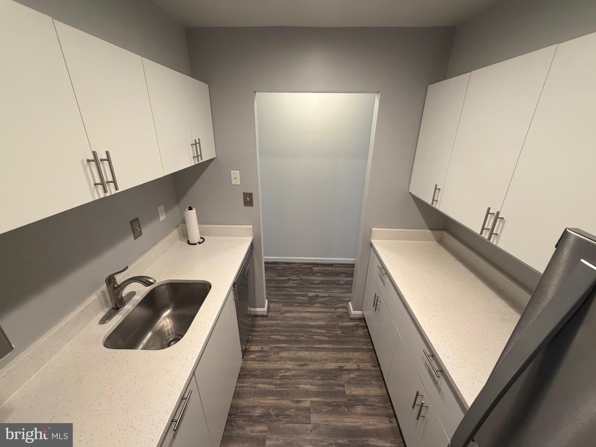 5918 Cove Landing Road, Unit 204 Burke, VA 22015 - Photo 40 of 50 a utility room with dryer and washer
