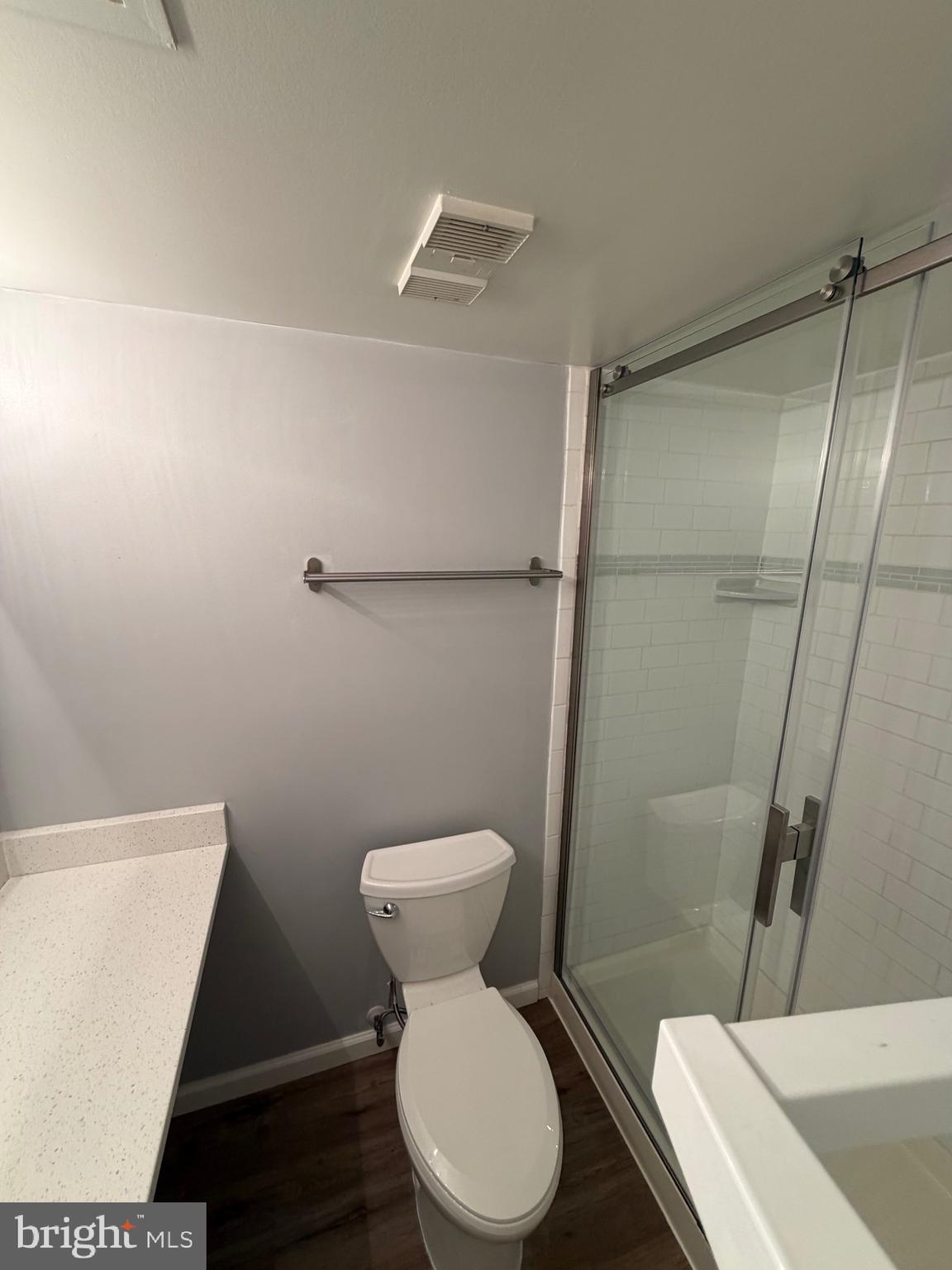 5918 Cove Landing Road, Unit 204 Burke, VA 22015 - Photo 43 of 50 a white toilet sitting next to a bathroom sink