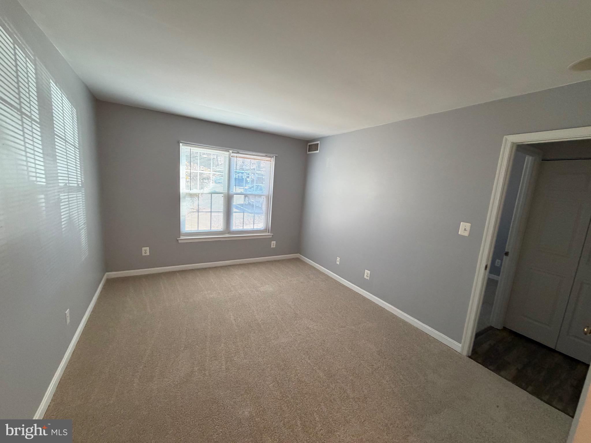 5918 Cove Landing Road, Unit 204 Burke, VA 22015 - Photo 50 of 50 an empty room with a window