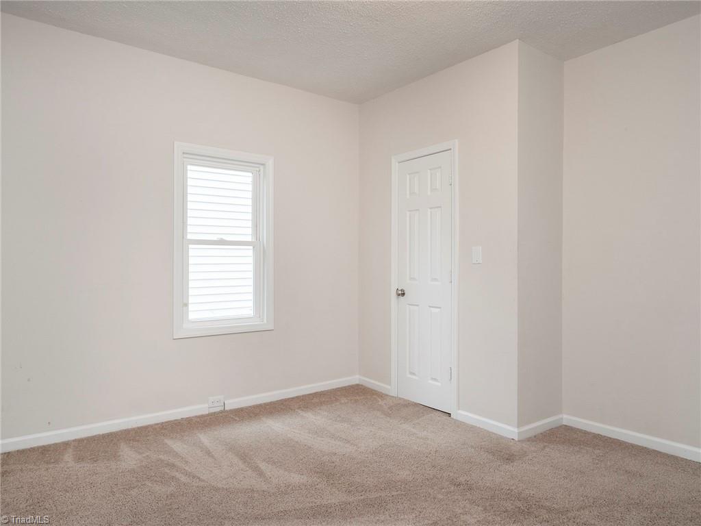 1009 Forrest Street High Point, NC 27262 - Photo 16 of 27 Bedroom 1 looking over side yard.