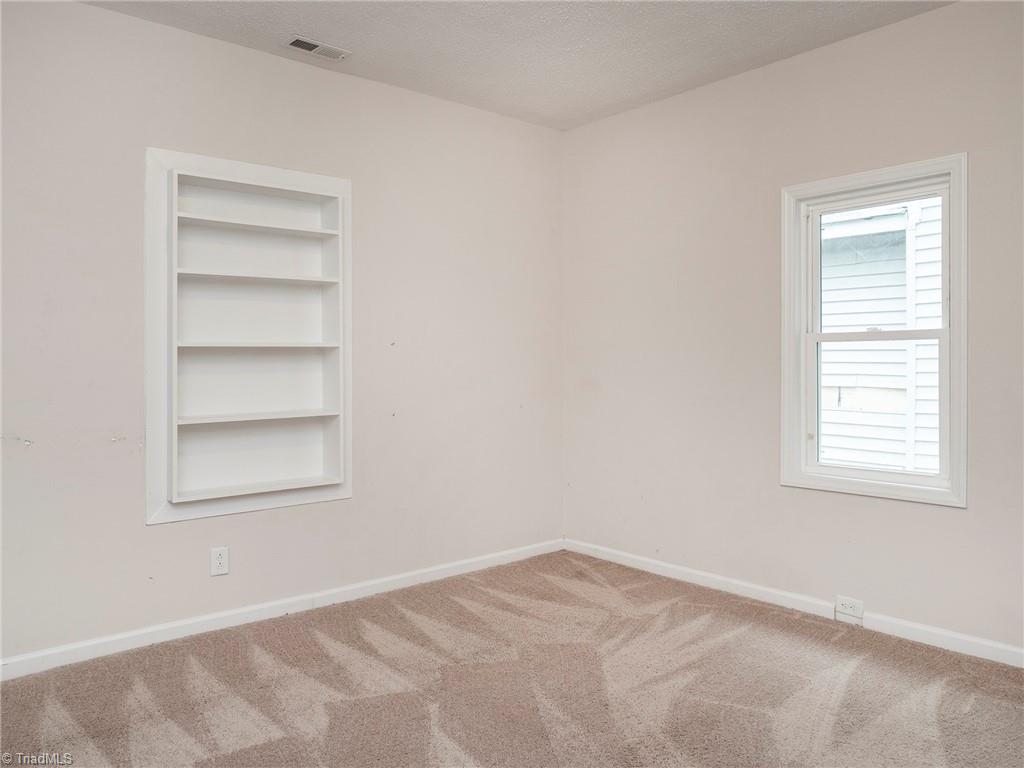 1009 Forrest Street High Point, NC 27262 - Photo 6 of 27 Bedroom 1 with built in shelves.
