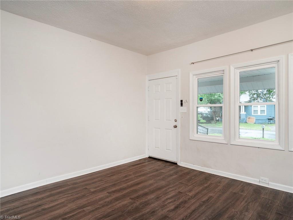 1009 Forrest Street High Point, NC 27262 - Photo 8 of 27 Living room looking into the front porch.