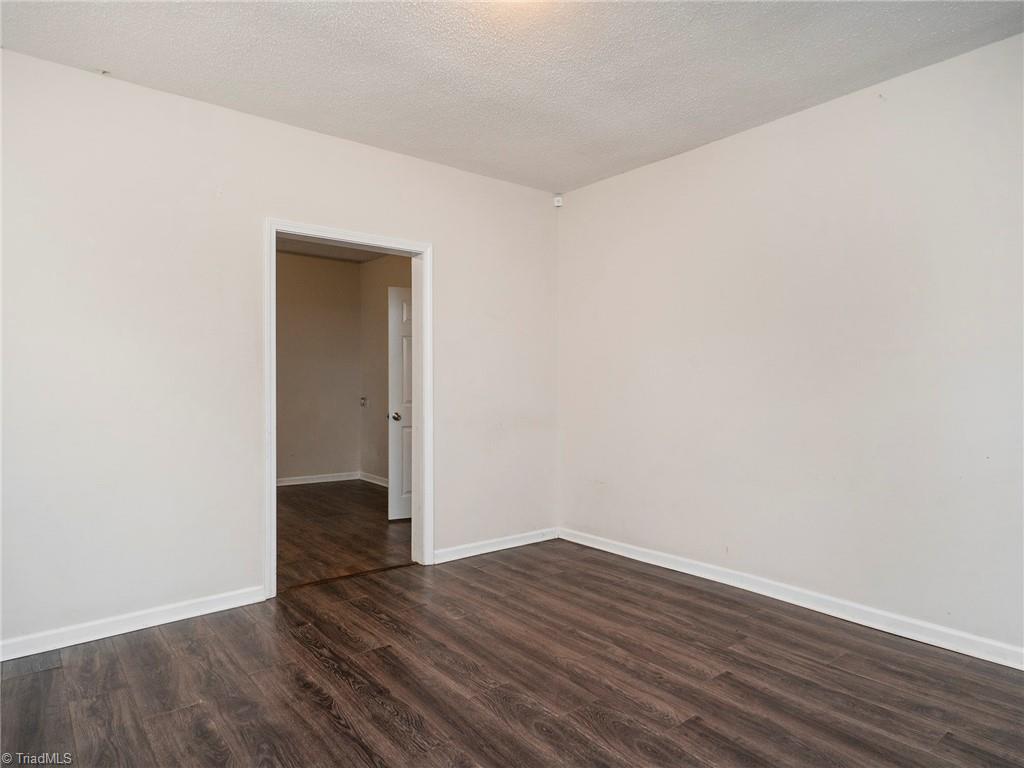 1009 Forrest Street High Point, NC 27262 - Photo 9 of 27 View from the living room in to the dining room.