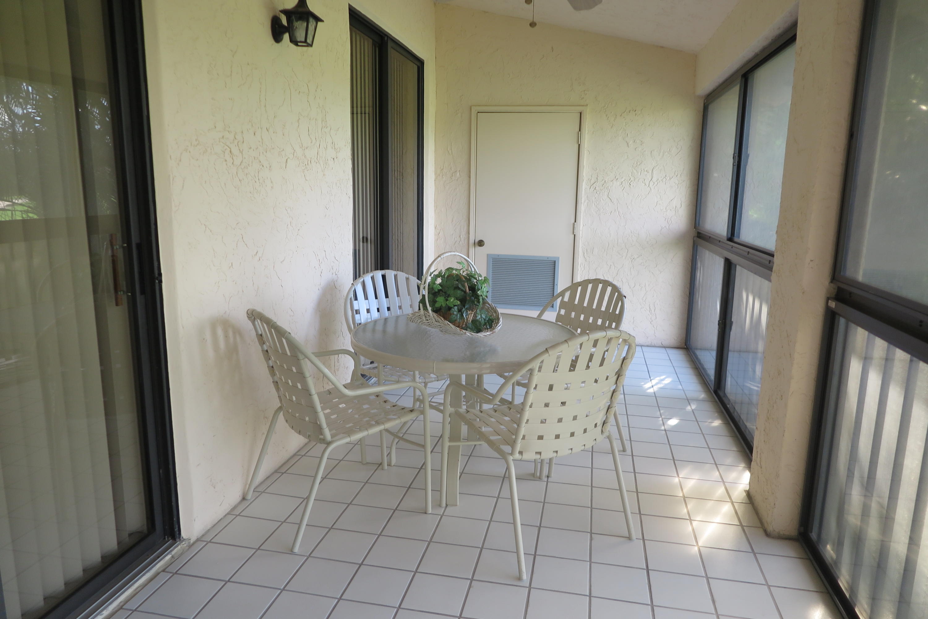 7832 La Mirada Drive Boca Raton, FL 33433 - Photo 13 of 15 ENCLOSED PORCH