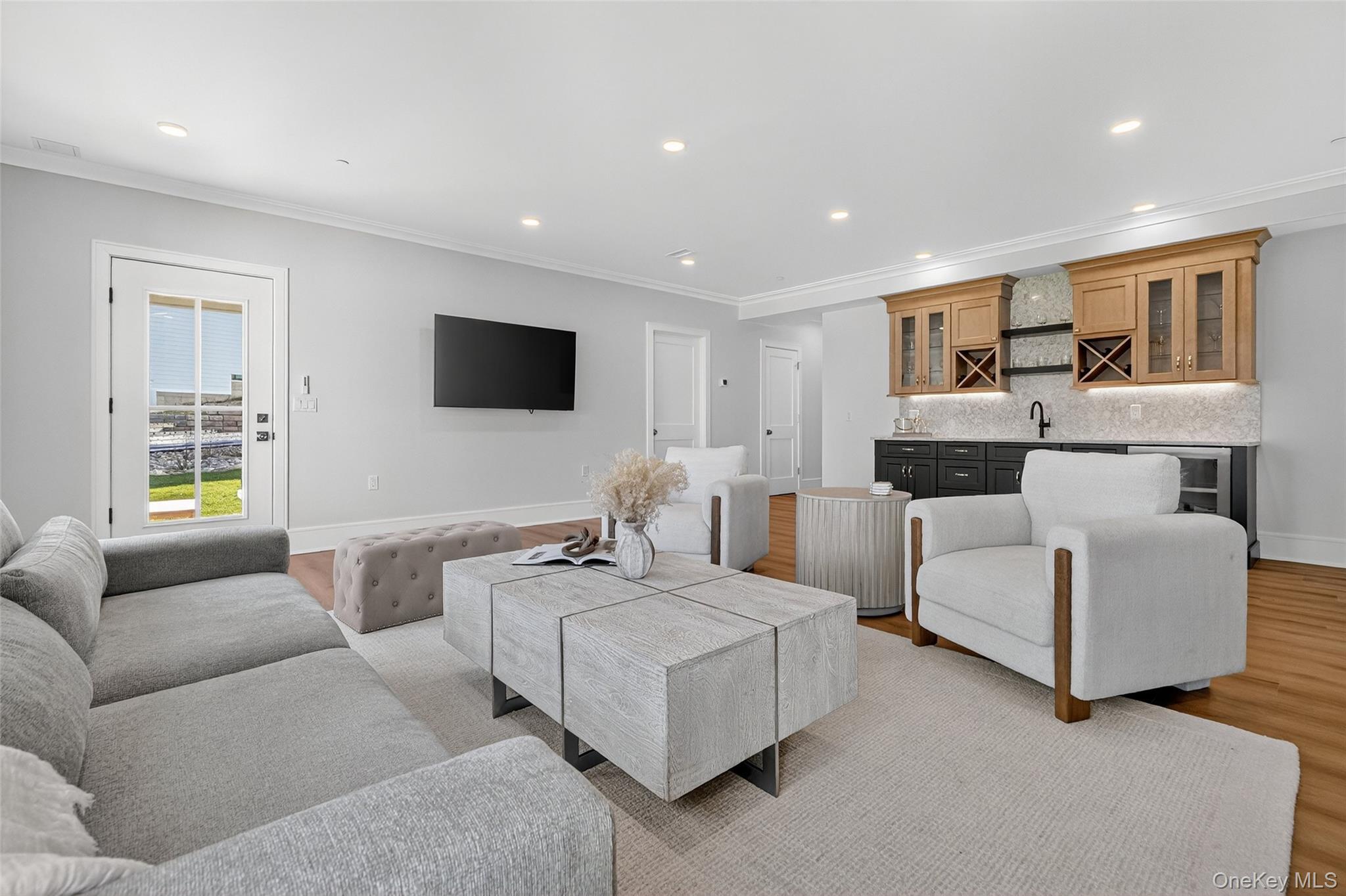 1806 Soundview Court Yorktown Heights, NY 10598 - Photo 32 of 39 a living room with furniture and a flat screen tv