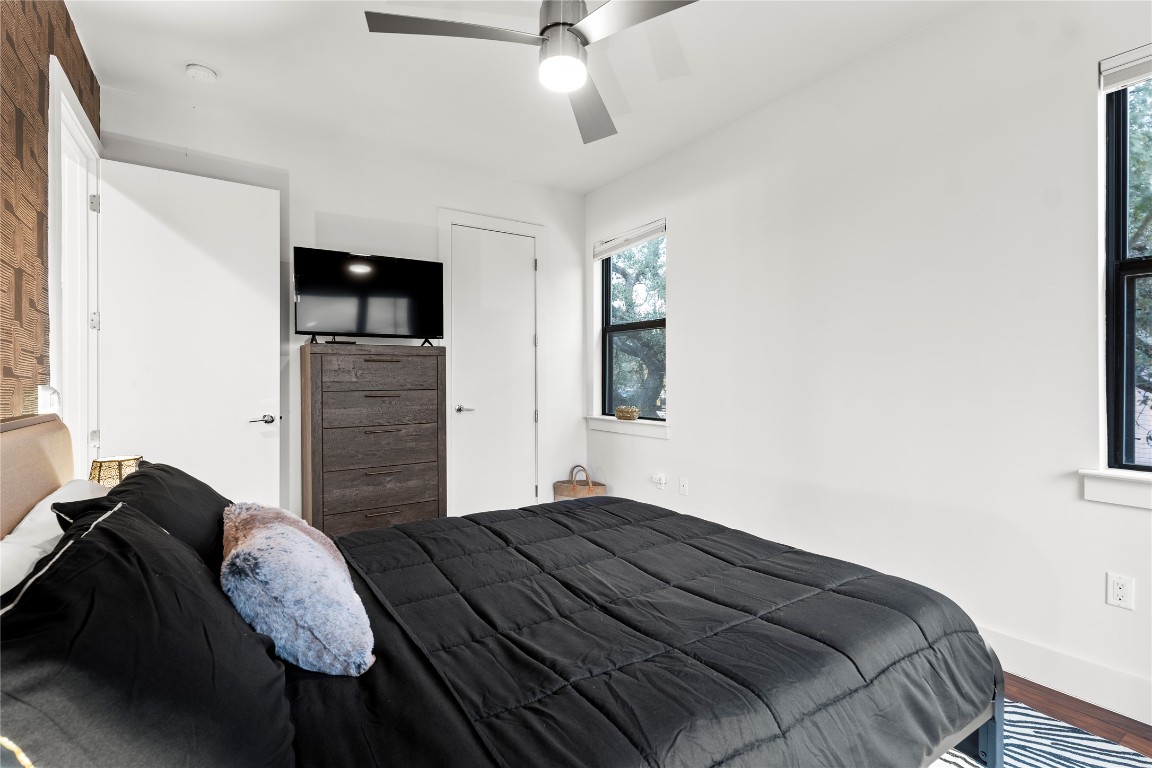 1105 East 12th Street Austin, TX 78702 - Photo 15 of 28 a bedroom with bed and window