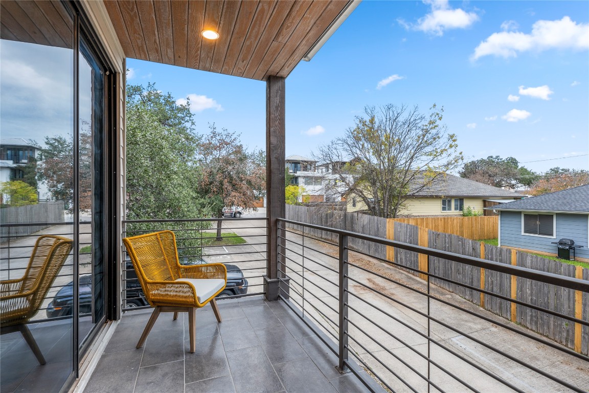 1105 East 12th Street Austin, TX 78702 - Photo 18 of 28 a view of a balcony with lake view and a potted plant