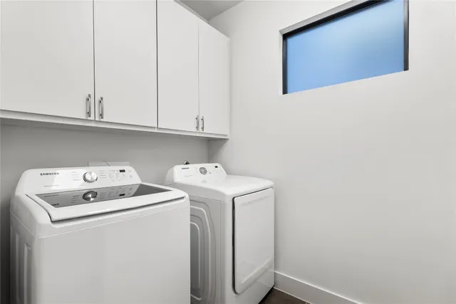 a view of a balcony with lake view and a potted plant
