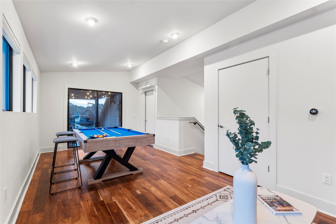 1105 East 12th Street Austin, TX 78702 - Photo 20 of 28 a workspace with furniture and wooden floor