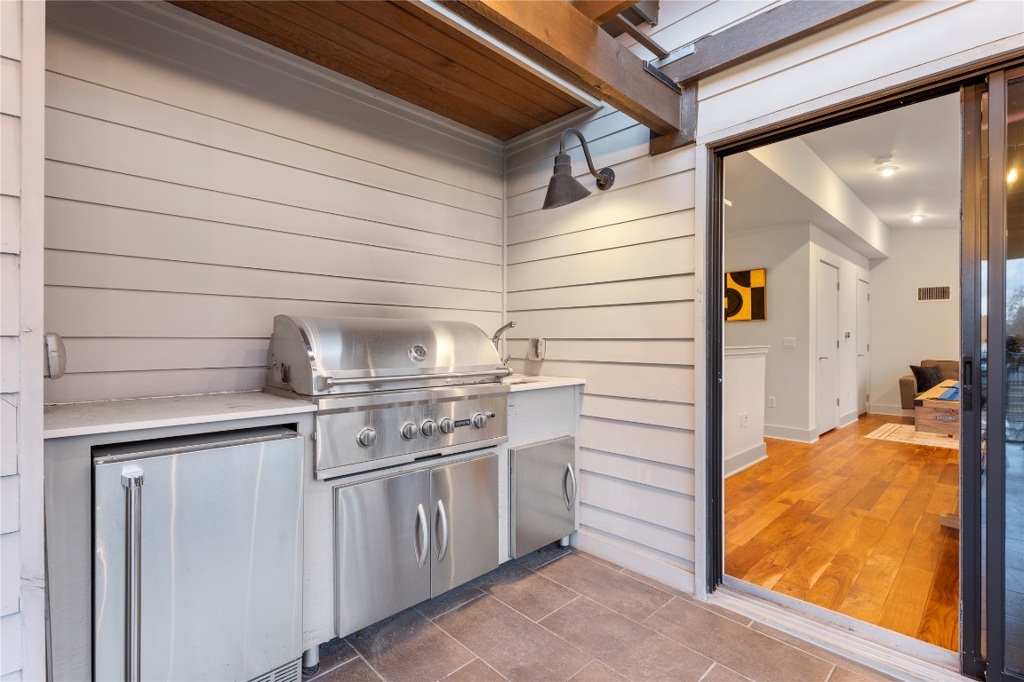 1105 East 12th Street Austin, TX 78702 - Photo 22 of 28 a view of a closet and wooden floor