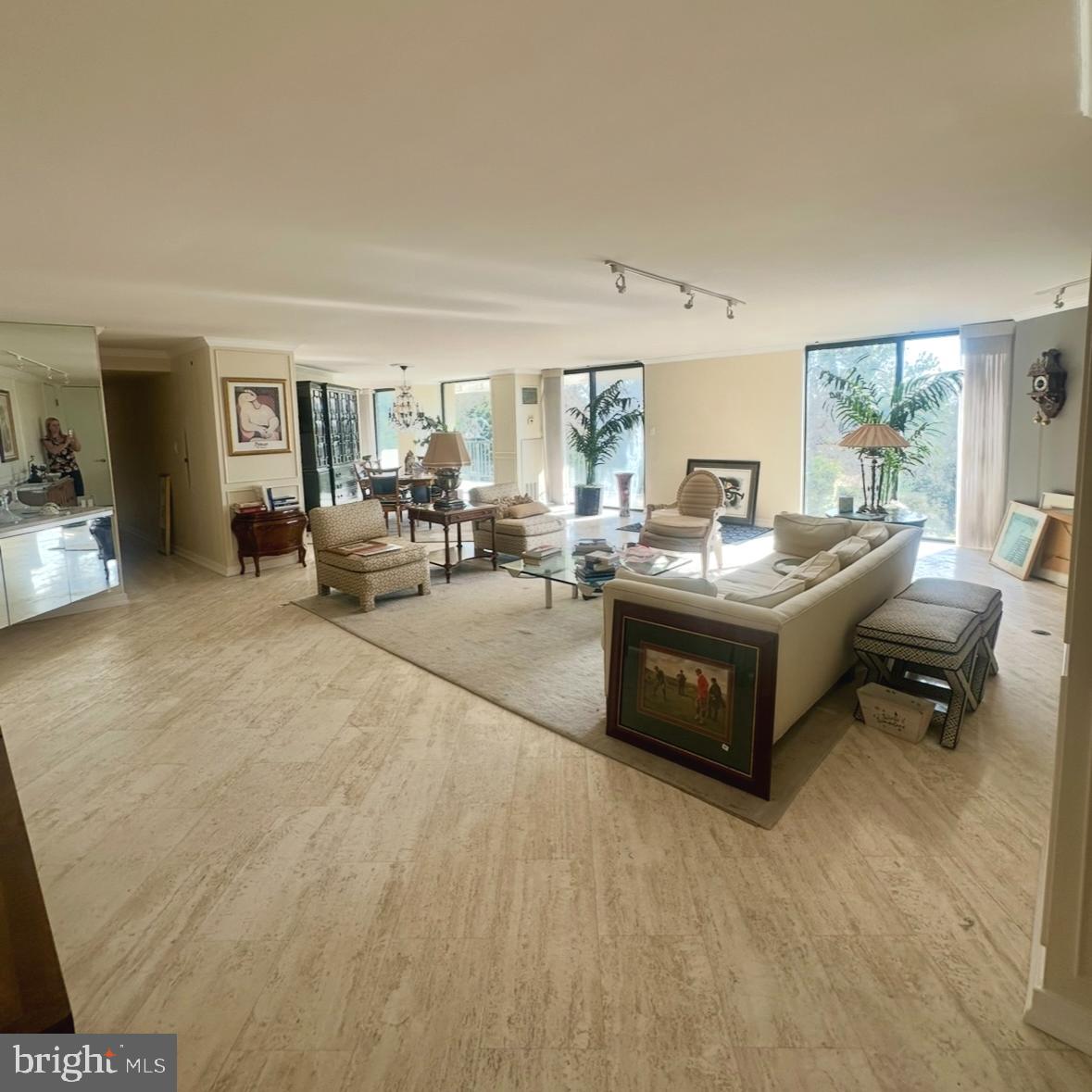 8302 Old York Road, Unit C61 Elkins Park, PA 19027 - Photo 2 of 25 a living room with furniture and a table