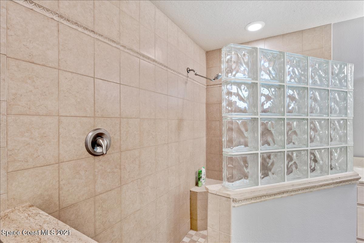 2825 Corey Road Malabar, FL 32950 - Photo 15 of 44 a bathroom with a shower