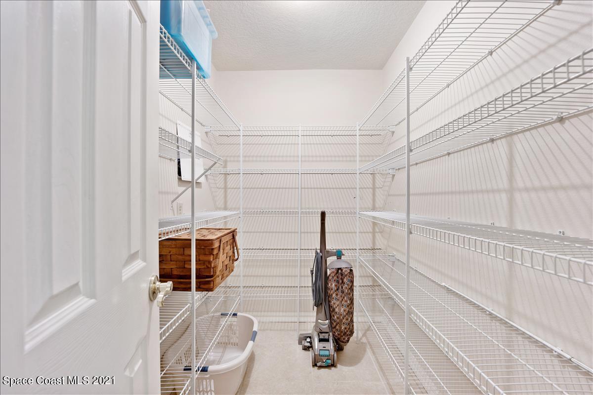 2825 Corey Road Malabar, FL 32950 - Photo 19 of 44 a bathroom with a sink and a shower