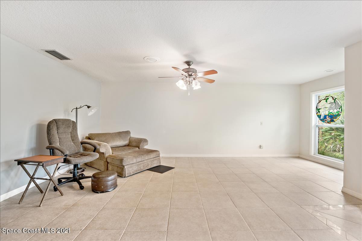 2825 Corey Road Malabar, FL 32950 - Photo 26 of 44 a living room with furniture