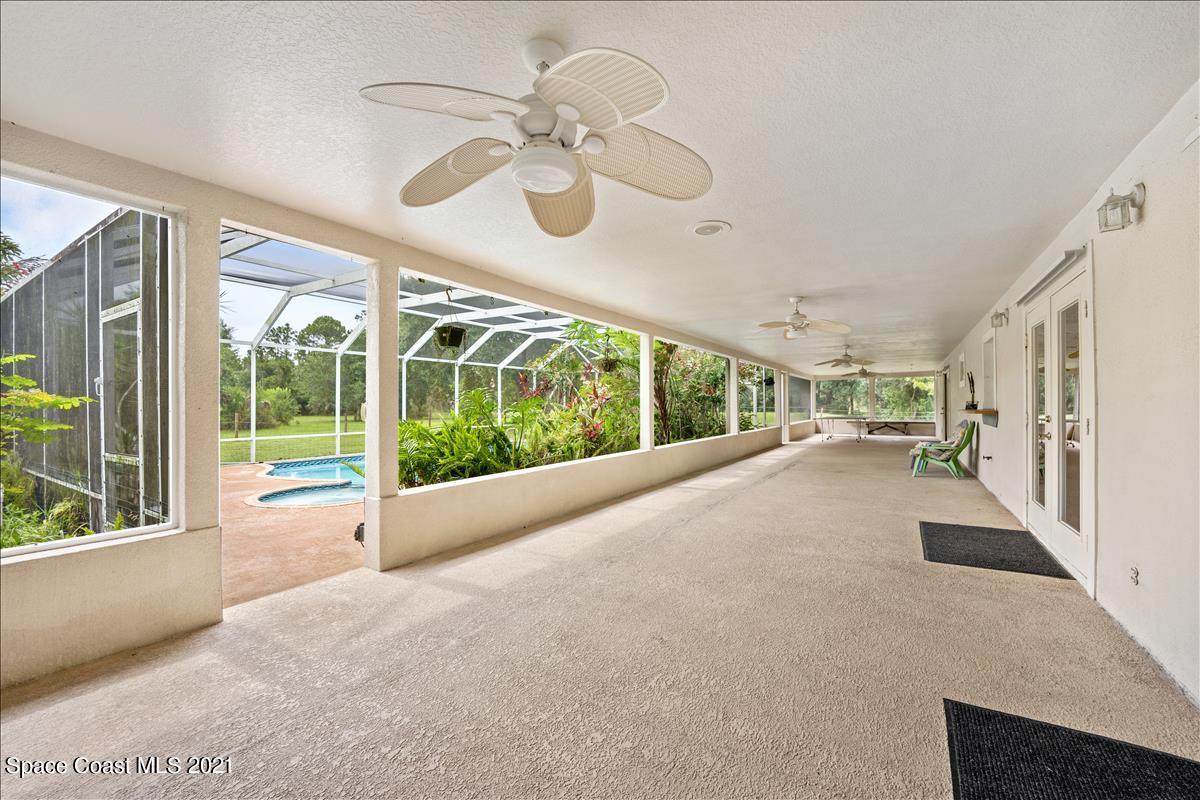 2825 Corey Road Malabar, FL 32950 - Photo 30 of 44 a view of a living room and a large window