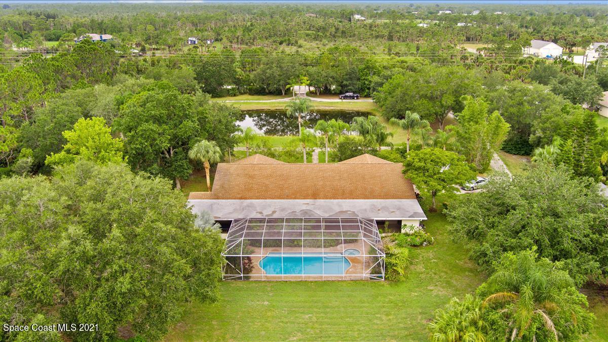 2825 Corey Road Malabar, FL 32950 - Photo 41 of 44 a view of a city with tall buildings