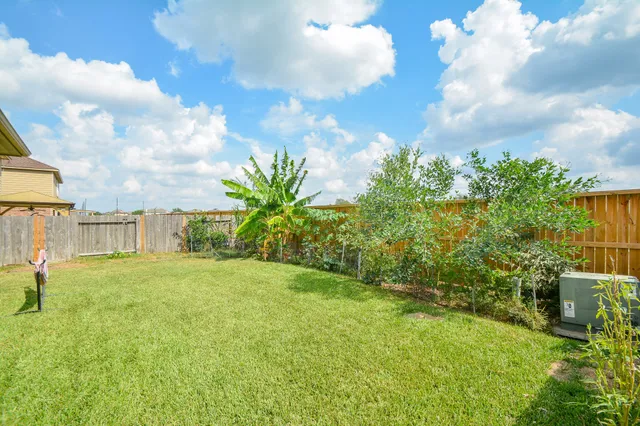 a balcony with furniture and garden