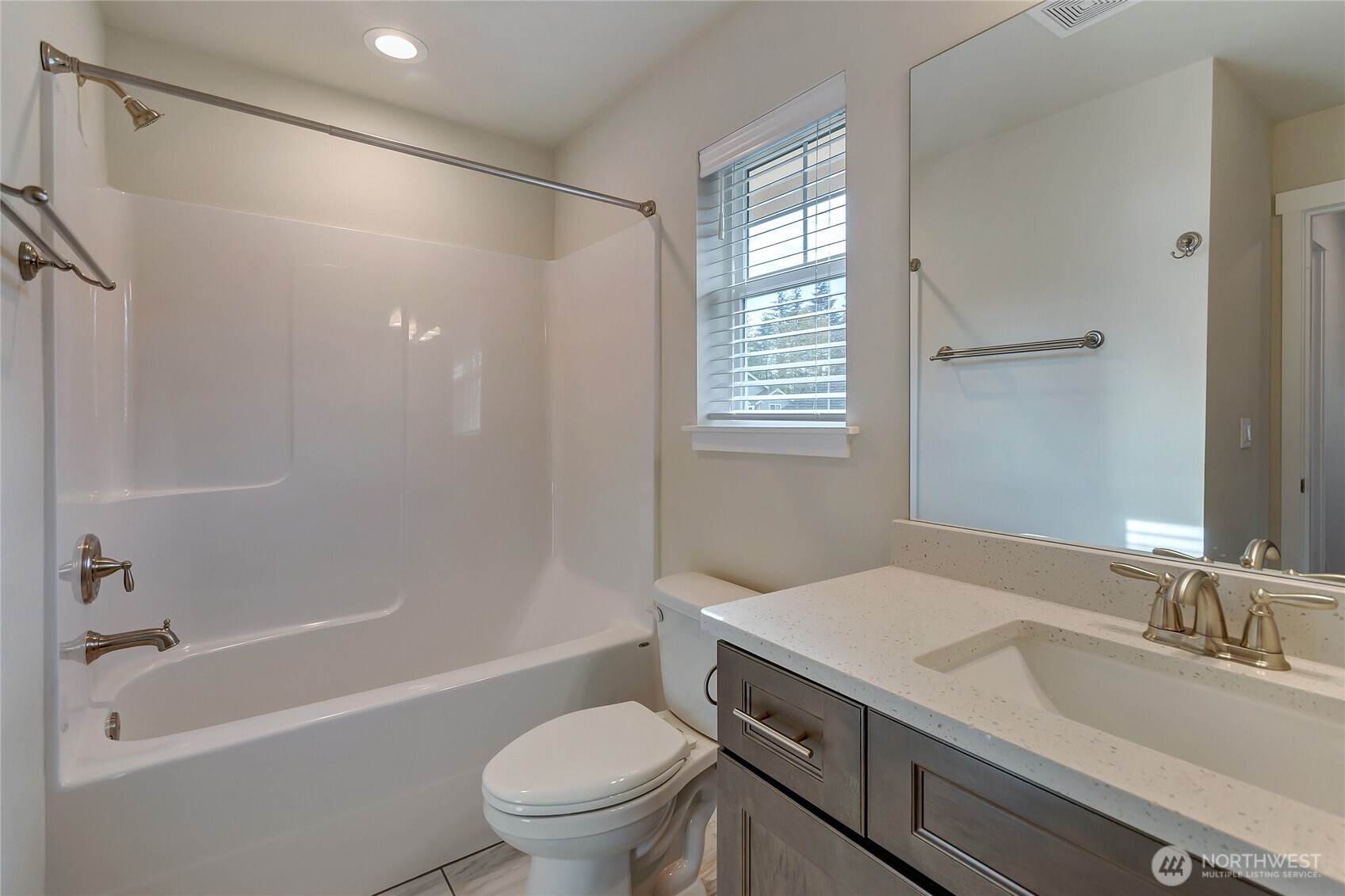 2213 Trail View Street Northeast Olympia, WA 98506 - Photo 25 of 40 a bathroom with a sink a toilet and a bathtub