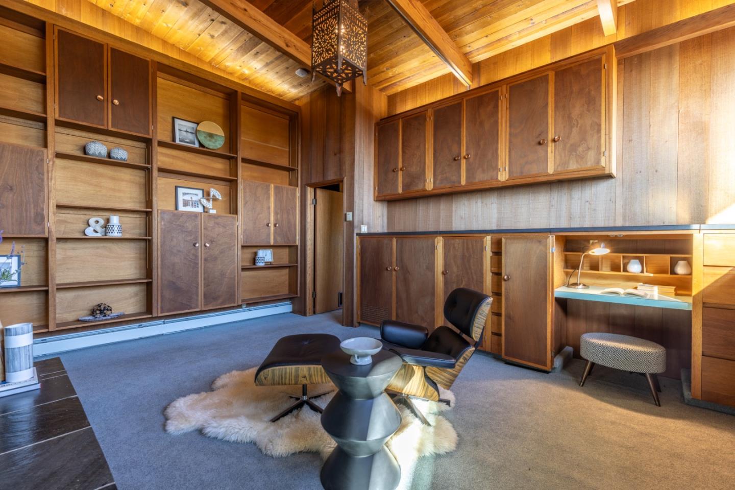 800 Rancho Prieta Road Los Gatos, CA 95033 - Photo 14 of 55 a living room with furniture gym equipment and a rug
