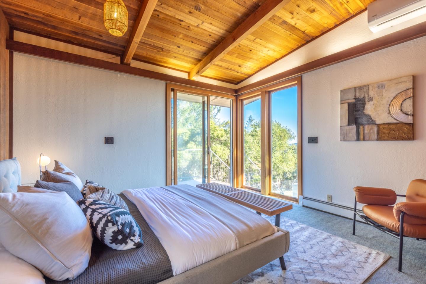 800 Rancho Prieta Road Los Gatos, CA 95033 - Photo 16 of 55 a bedroom with a bed and a chair