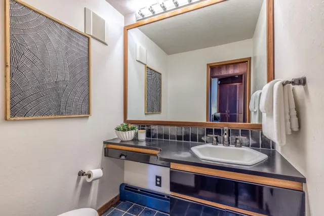 a view of a table and chairs in a patio