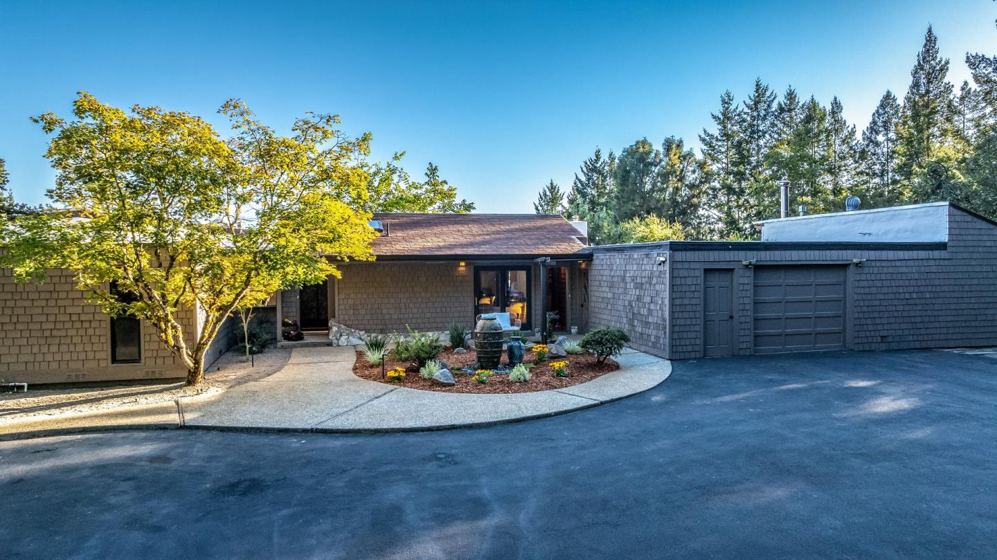 800 Rancho Prieta Road Los Gatos, CA 95033 - Photo 26 of 55 a view of a table and chairs in a patio