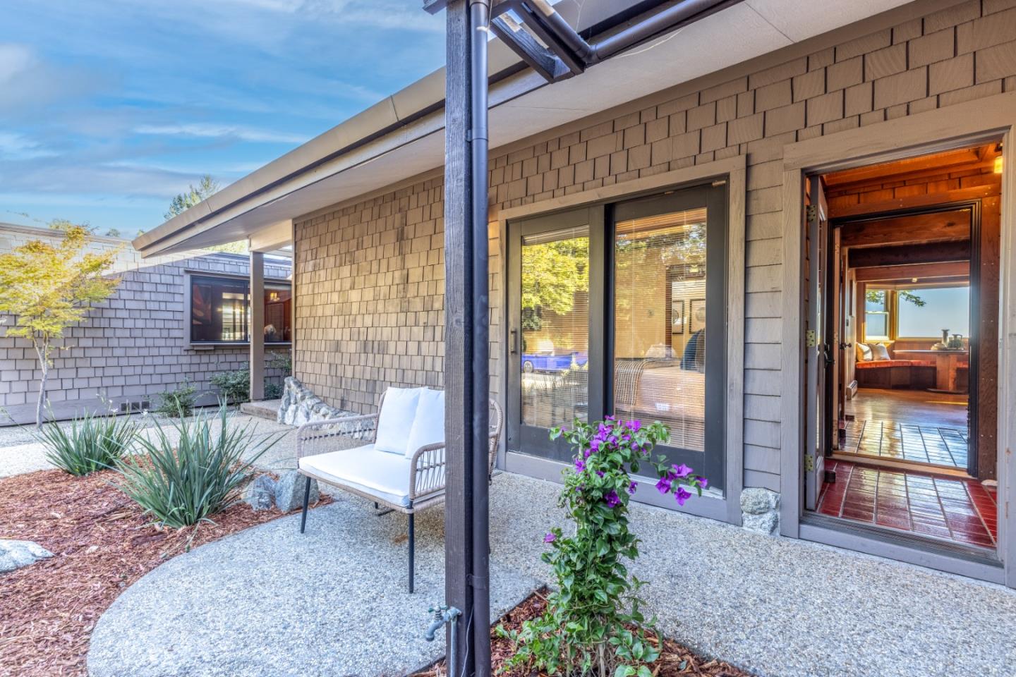 800 Rancho Prieta Road Los Gatos, CA 95033 - Photo 45 of 55 a view of a porch with chairs and potted plants