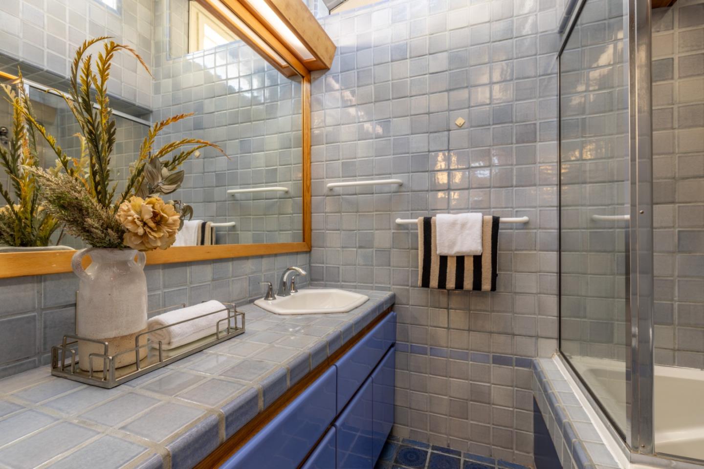 800 Rancho Prieta Road Los Gatos, CA 95033 - Photo 48 of 55 a bathroom with a sink and a mirror