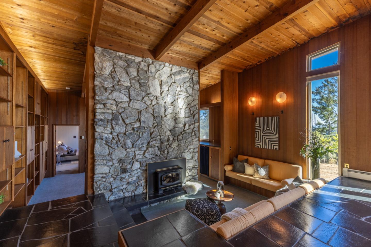 800 Rancho Prieta Road Los Gatos, CA 95033 - Photo 10 of 55 a living room with furniture and a fireplace