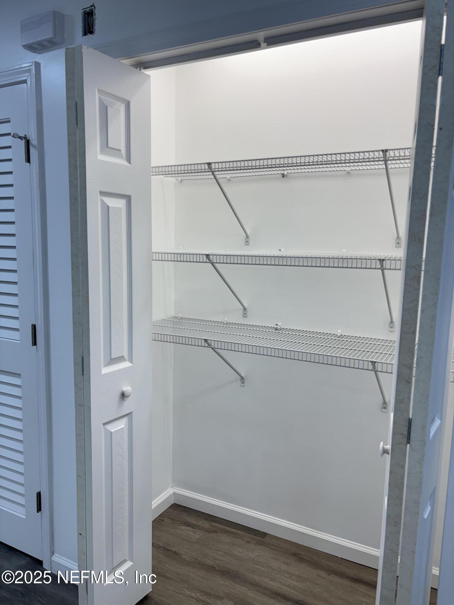 1992 West 20th Street Jacksonville, FL 32209 - Photo 20 of 28 a view of an empty walk in closet