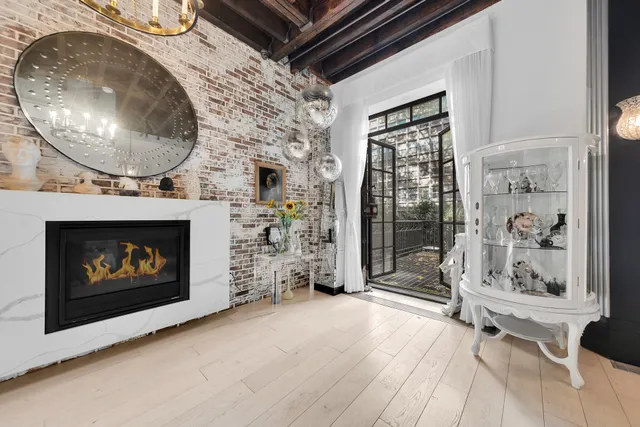 a bedroom with a bed and a table