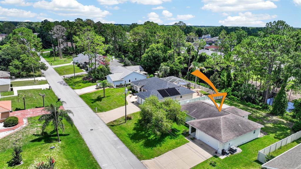 80 Roxboro Drive Palm Coast, FL 32164 - Photo 36 of 39 an aerial view of house with a yard