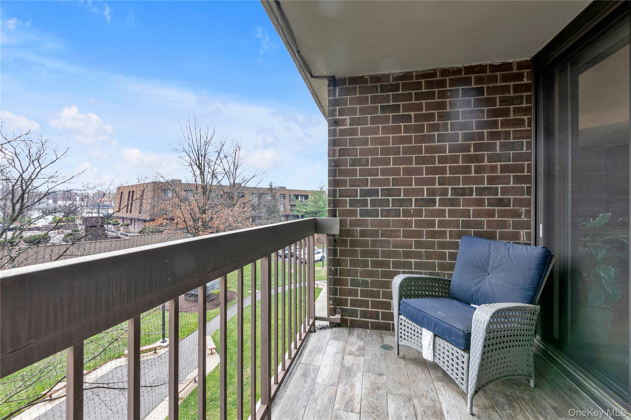 1 Bay Club Drive, Unit 4R Queens, NY 11360 - Photo 18 of 24 a view of a balcony with furniture