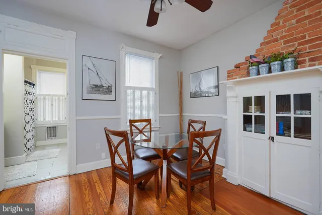 a kitchen with stainless steel appliances a refrigerator sink and cabinets