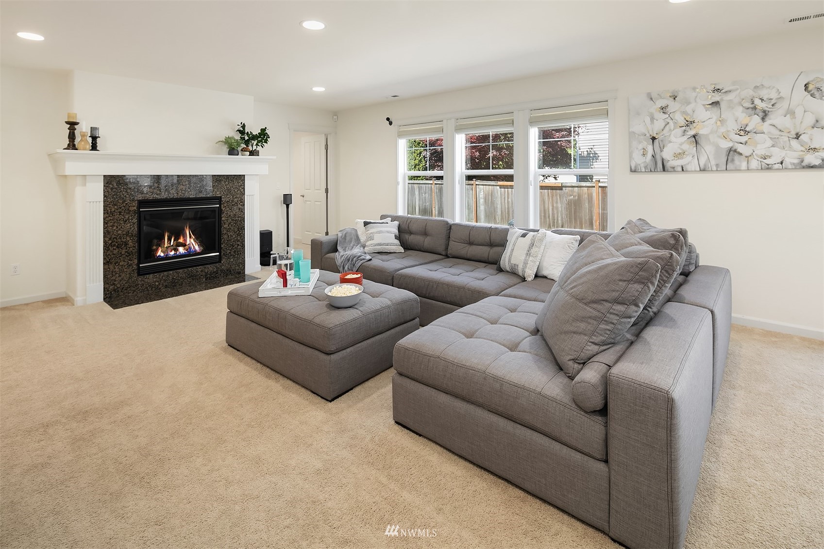 20521 Rustic View Road Southeast Monroe, WA 98272 - Photo 4 of 33 a living room with furniture and a fireplace
