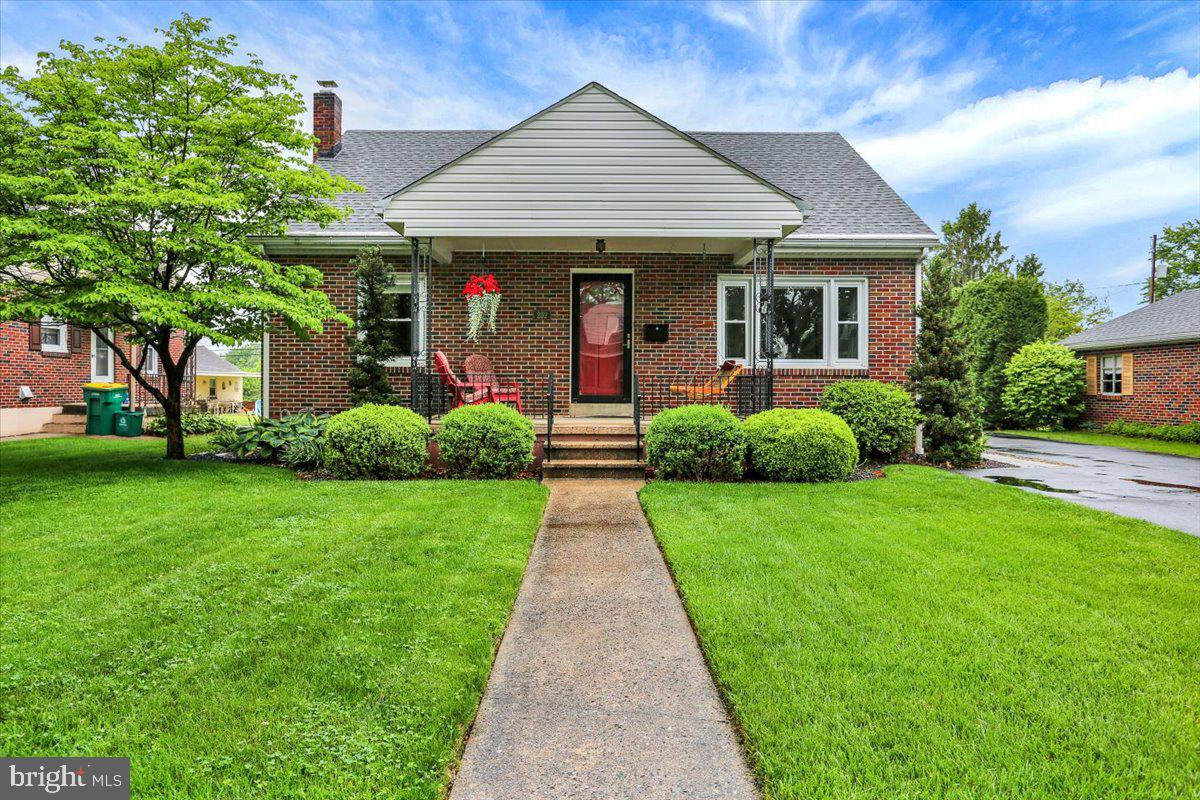 202 Old Fritztown Road Reading, PA 19607 - Photo 1 of 30 a front view of a house with yard and green space