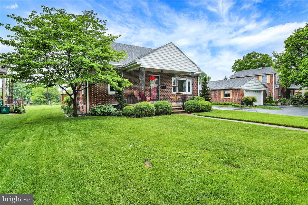 202 Old Fritztown Road Reading, PA 19607 - Photo 21 of 30 a front view of a house with garden