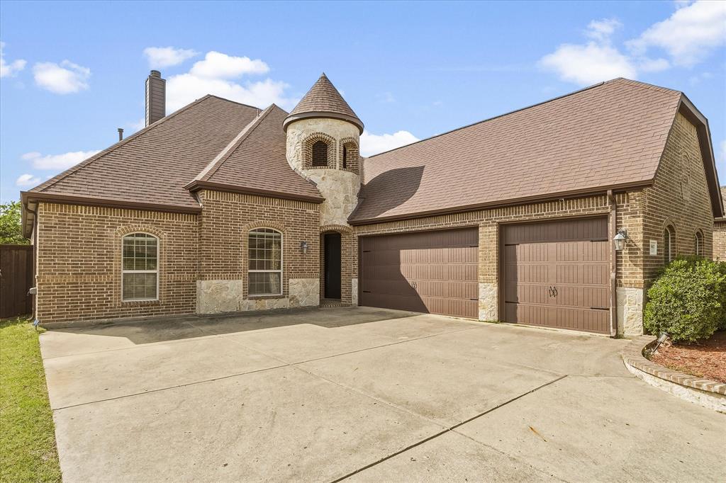 Gorgeous curb appeal welcomes your arrival