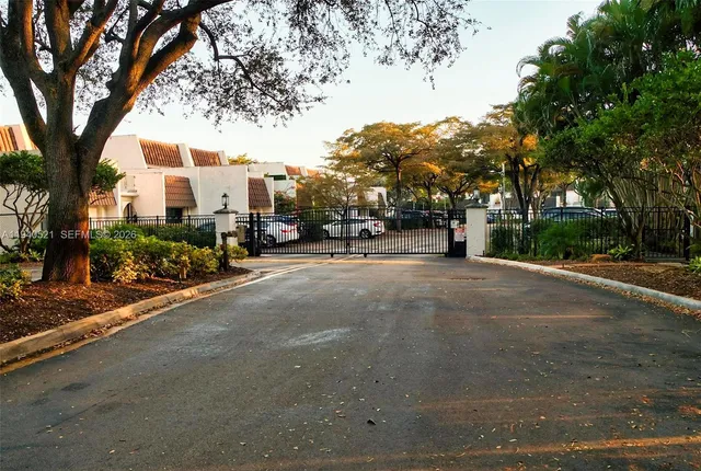 a car parked in front of a house