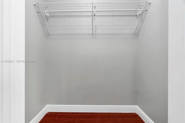 a view of a playground with basketball court