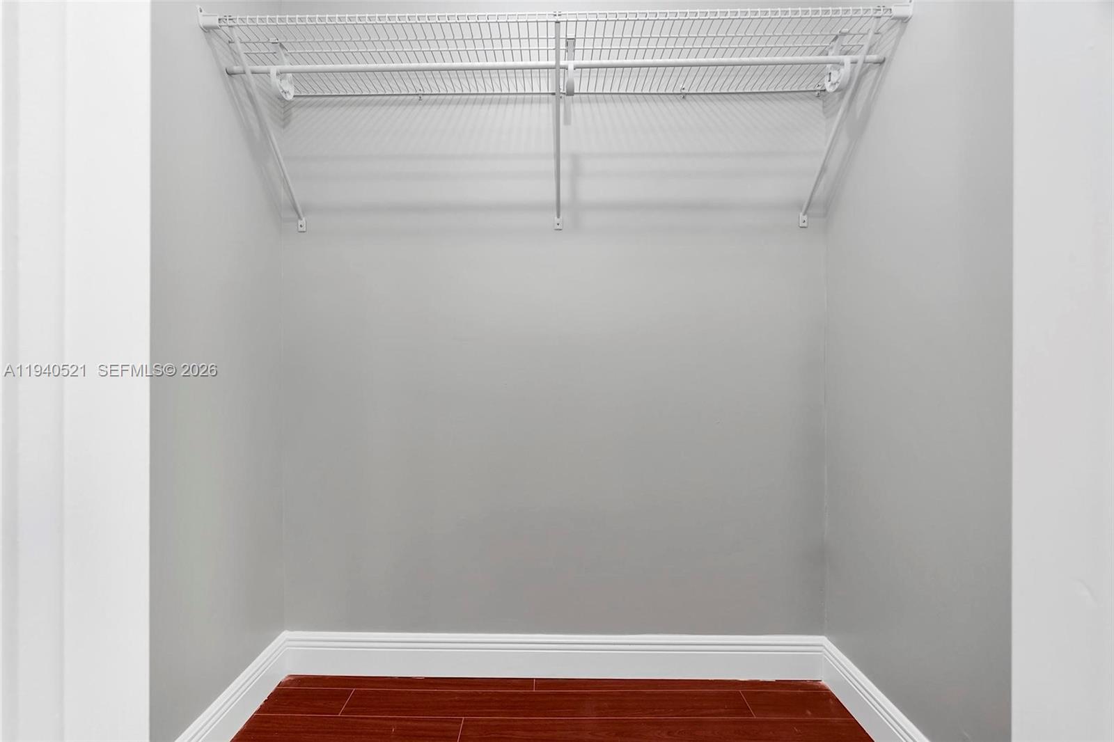 8898 Southwest 62nd Terrace, Unit 7F Miami, FL 33173 - Photo 47 of 66 a view of small space with racks on the wall