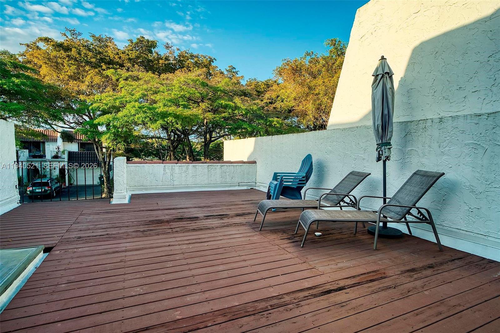 8898 Southwest 62nd Terrace, Unit 7F Miami, FL 33173 - Photo 49 of 66 a view of a terrace with chairs