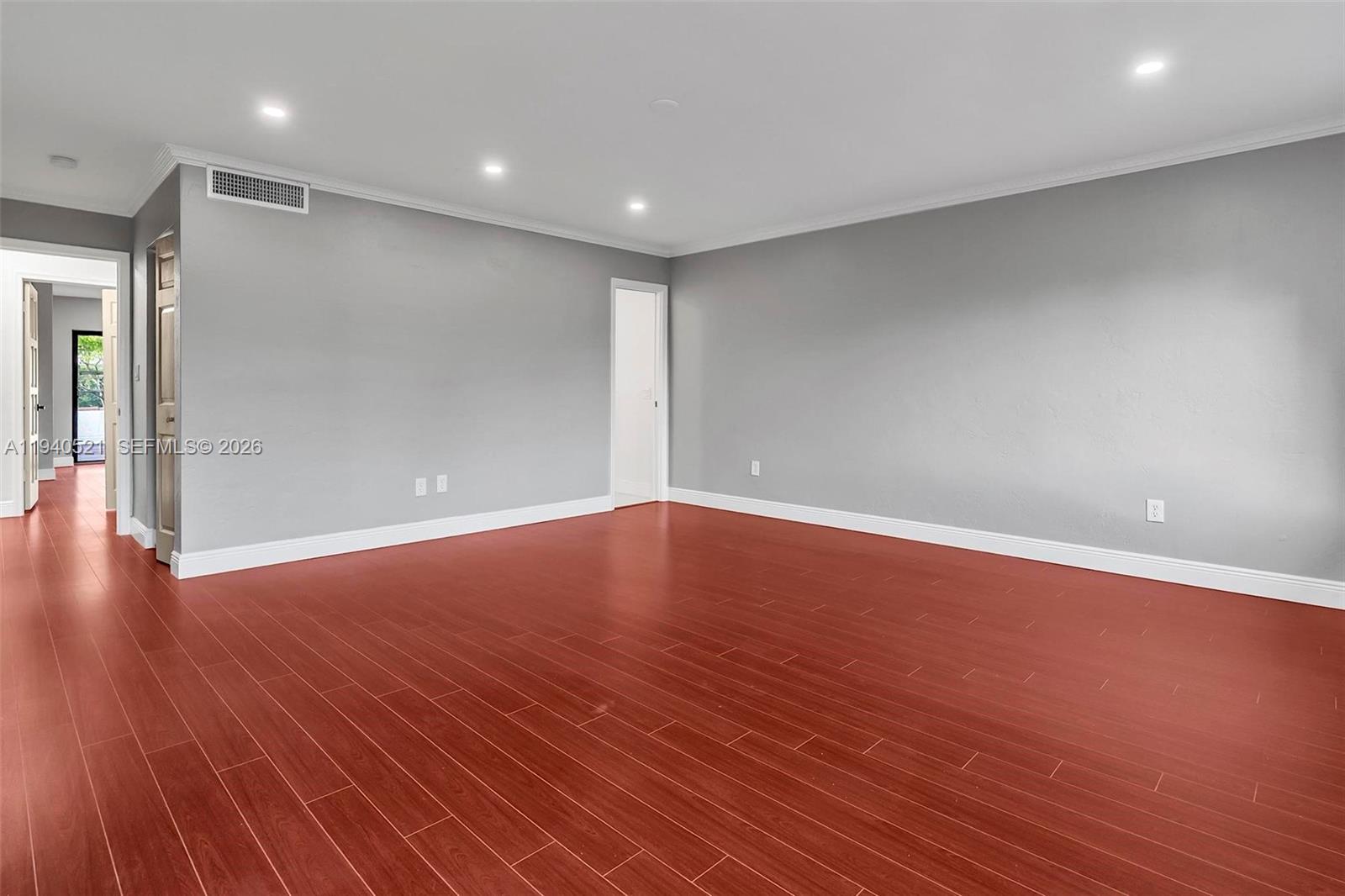 8898 Southwest 62nd Terrace, Unit 7F Miami, FL 33173 - Photo 56 of 66 a view of room with wooden floor