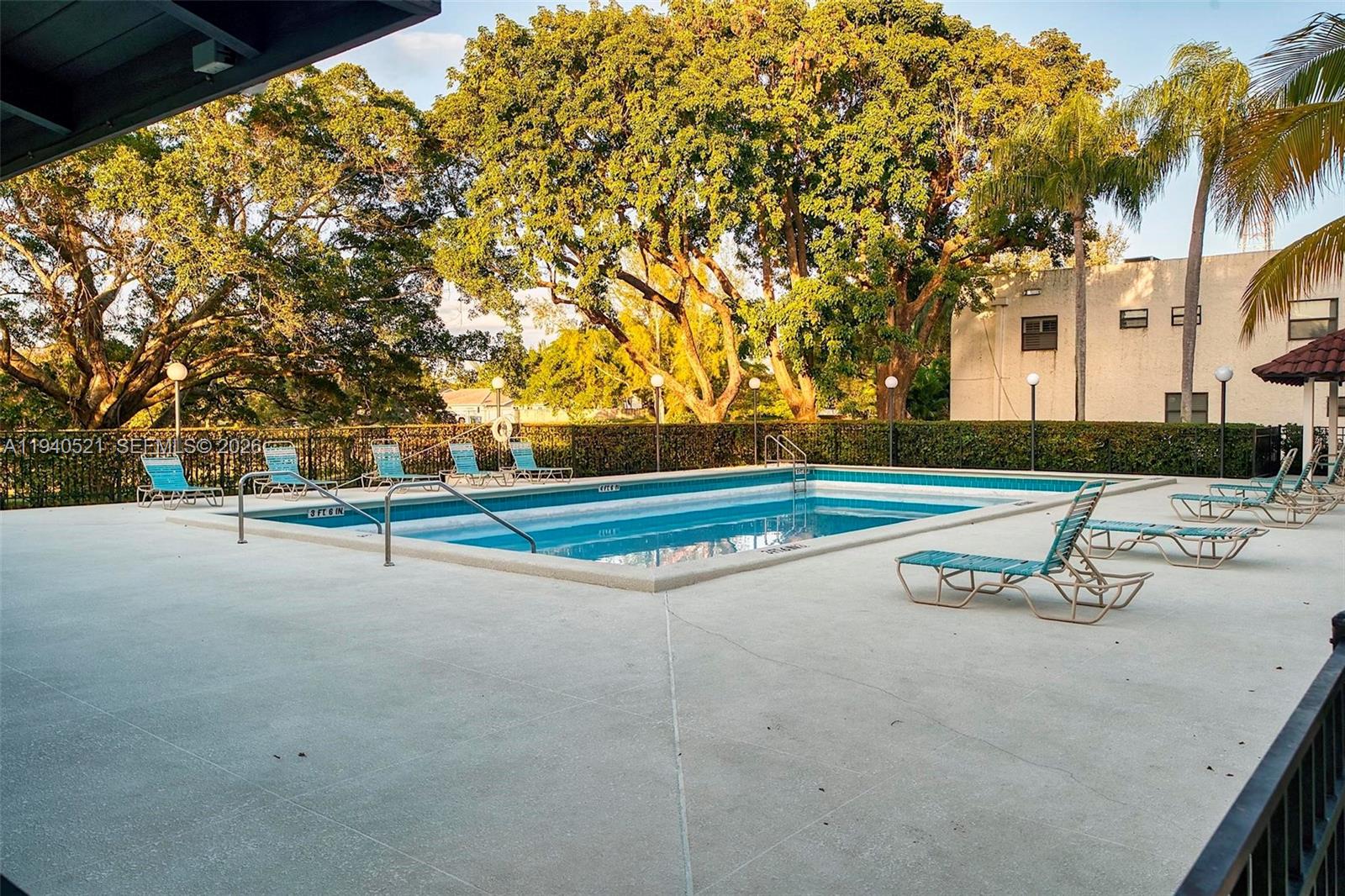 8898 Southwest 62nd Terrace, Unit 7F Miami, FL 33173 - Photo 63 of 66 a view of a playground with basketball court