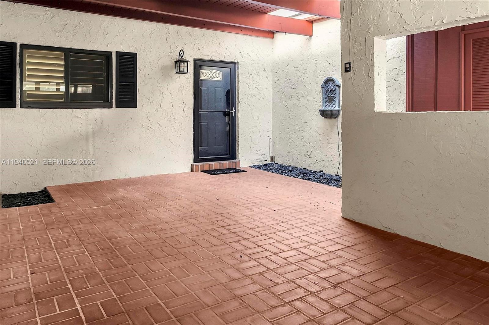 8898 Southwest 62nd Terrace, Unit 7F Miami, FL 33173 - Photo 9 of 66 a view of an empty room