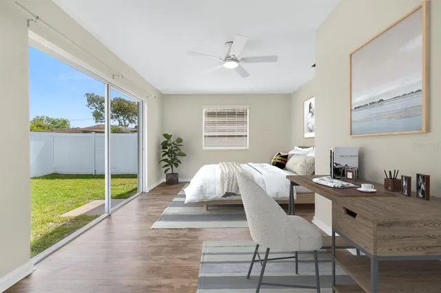 a living room with furniture and a yard